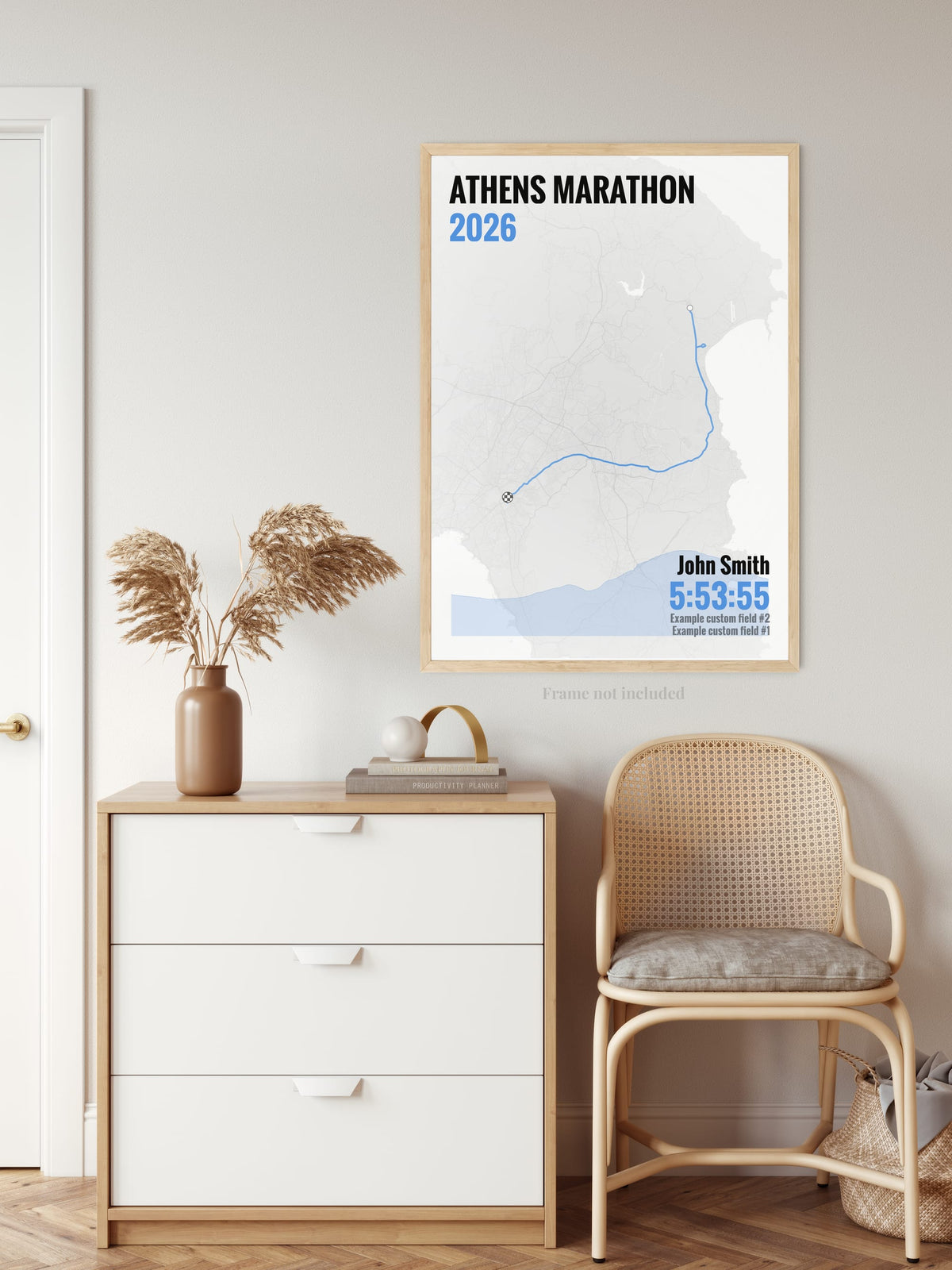 Athens Marathon route print in blue above a white dresser