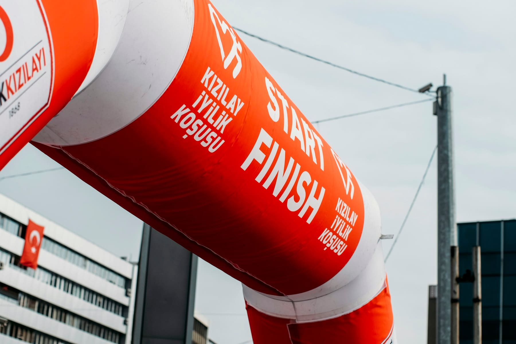 Orange start and finish arch at a road race